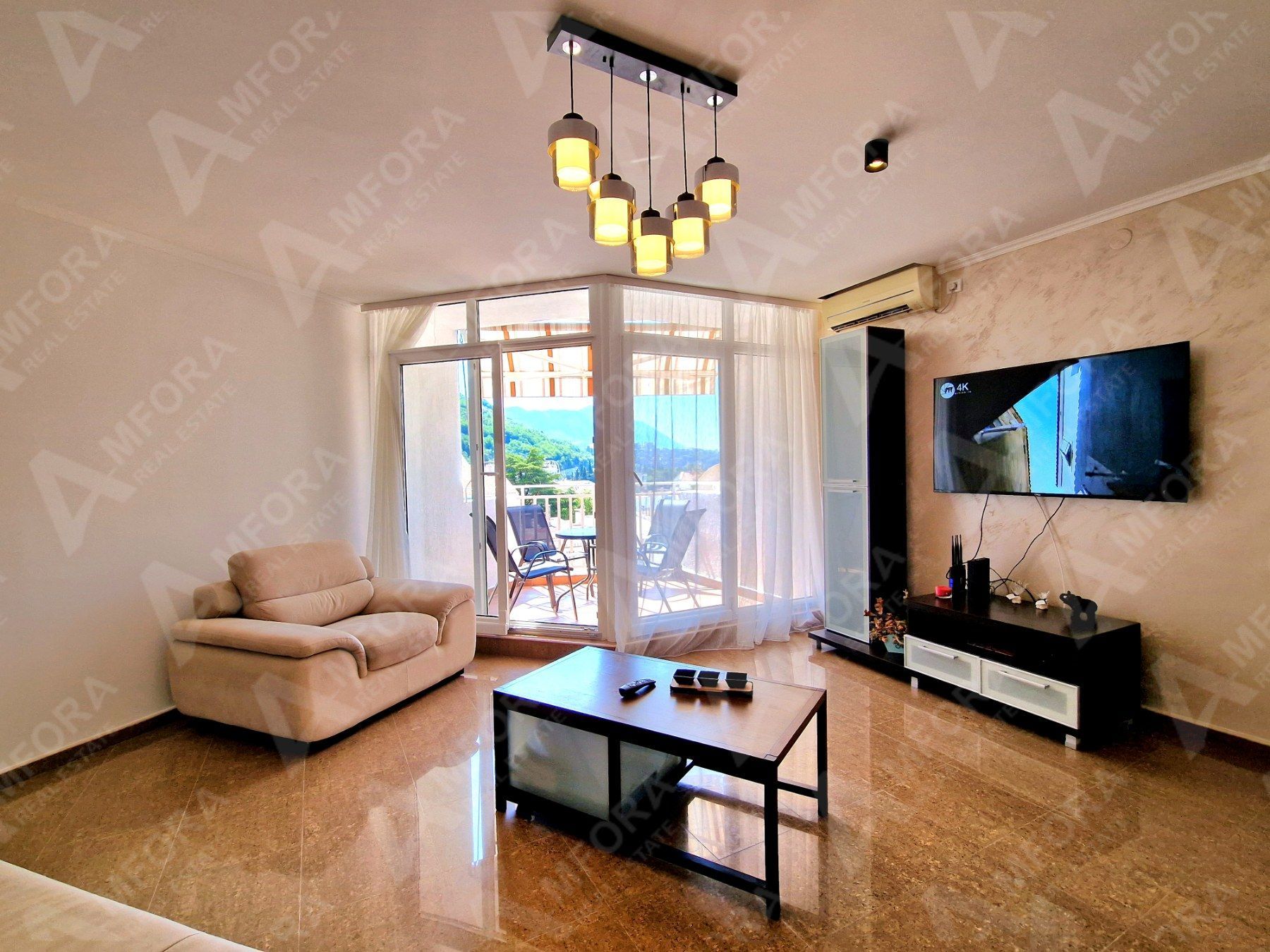 amforaproperty.com/Dvosoban stan sa pogledom na more i grad na odličnoj lokaciji kod hotela Slavije, Budva (Na period do 01.06.2024)