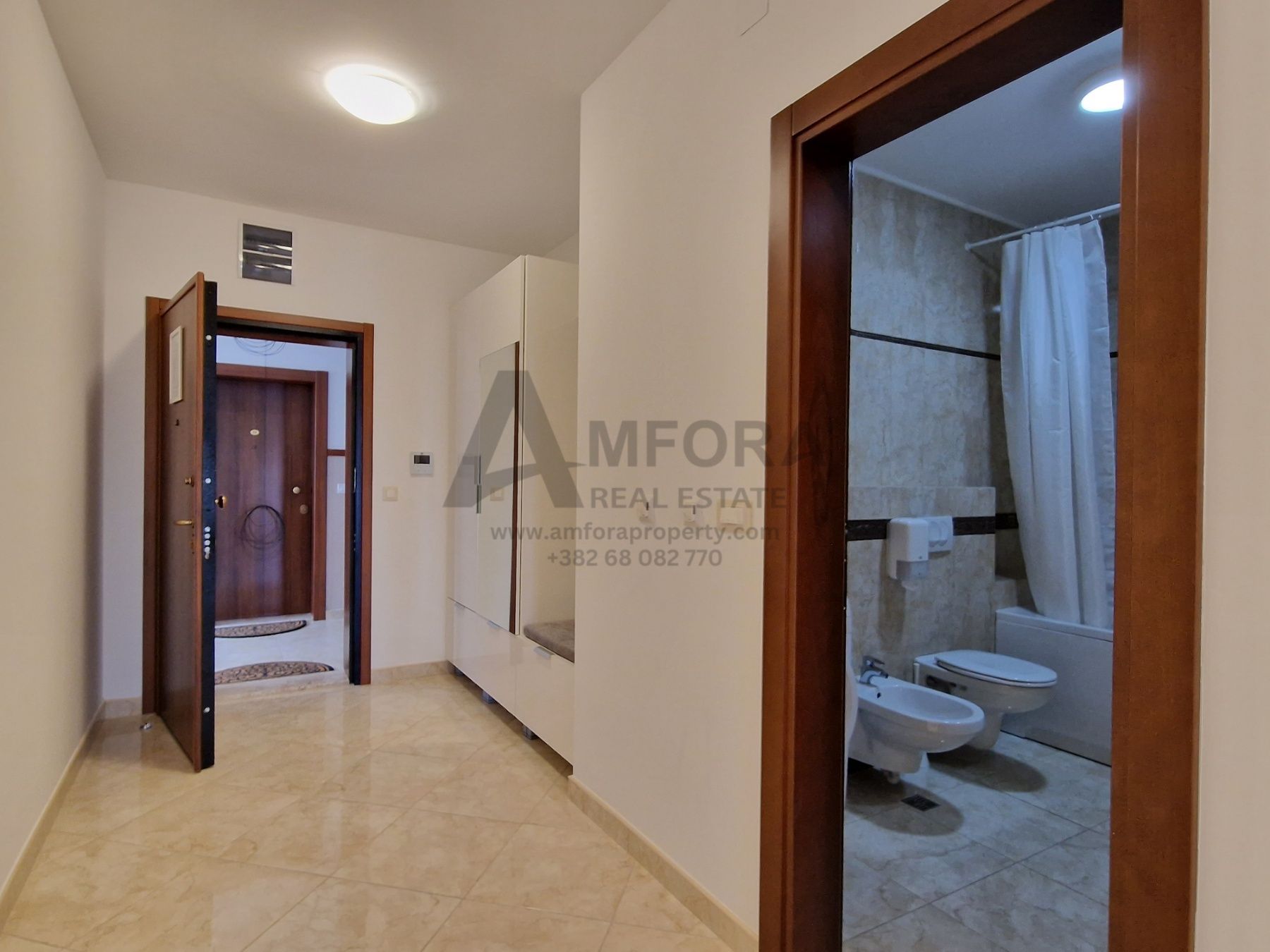 amforaproperty.com/Luksuzan dvosoban stan sa pogledom na more i garaznim mestom ukljucenim u cenu, Anatolia- Bečići (NA DUZI VREMENSKI PERIOD)