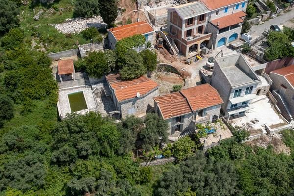 amforaproperty.com/Budva,Rezevici-Dve kamene kuce sa bazenom i panoramskim pogledom