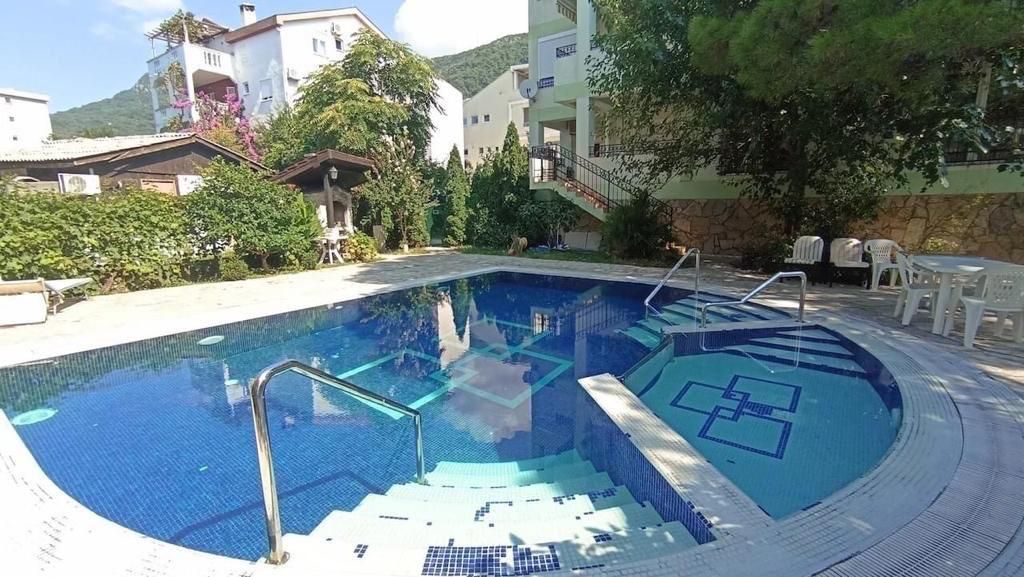 amforaproperty.com/Budva, Lazi - Dvosoban stan u zgradi sa bazenom (MOGUCNOST PLACANJA U RUSIJI)