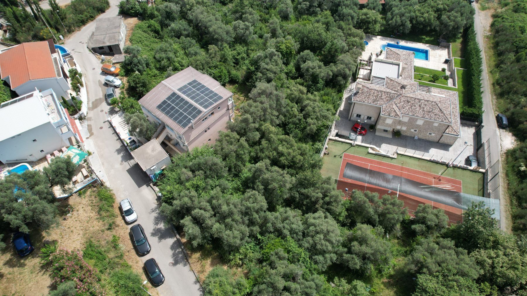 Plac 1597m2 sa Pogledom na More i Grad Bečići-Ivanovici - Amfora Real Estate