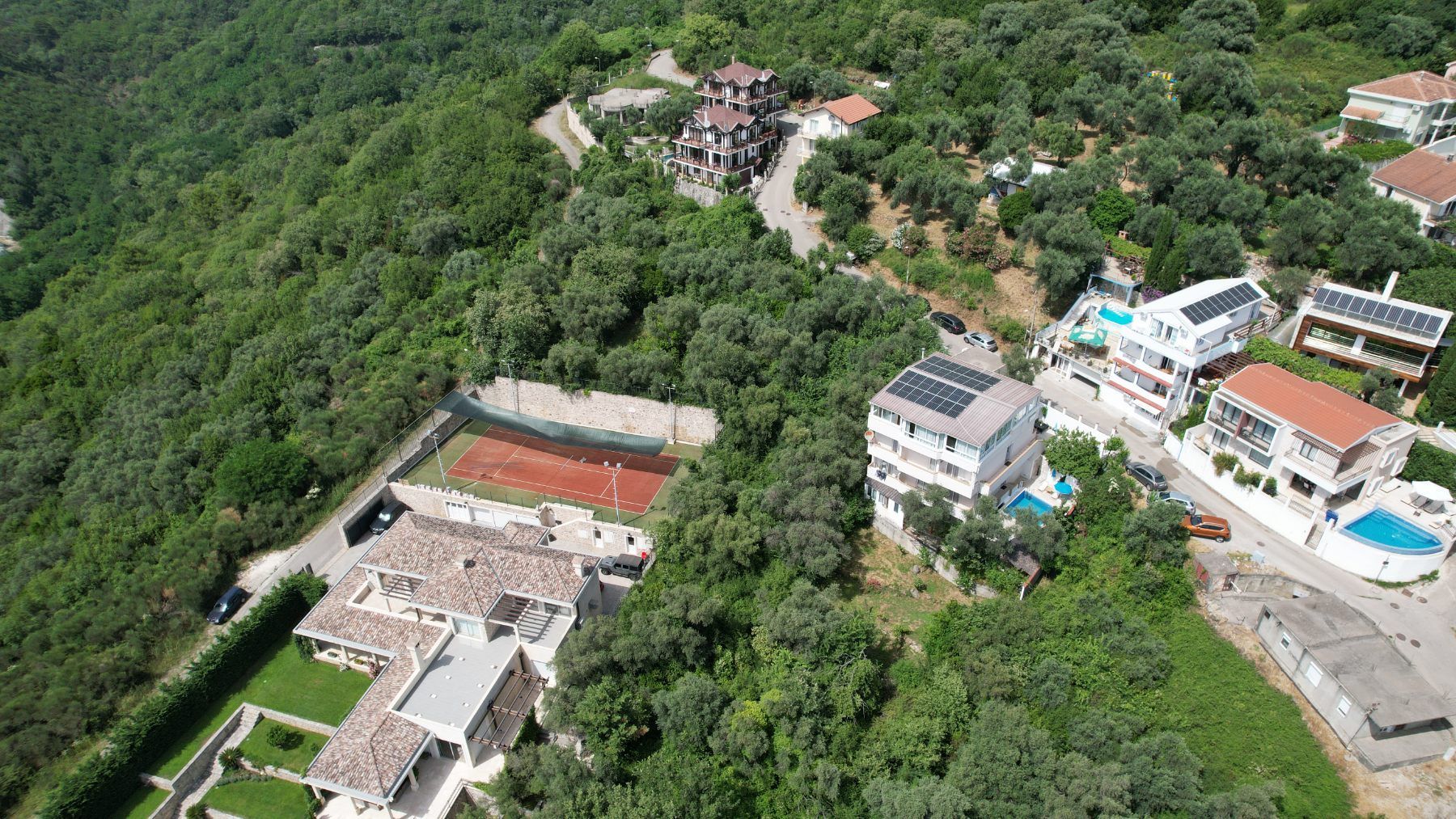 Plac 1597m2 sa Pogledom na More i Grad Bečići-Ivanovici - Amfora Real Estate