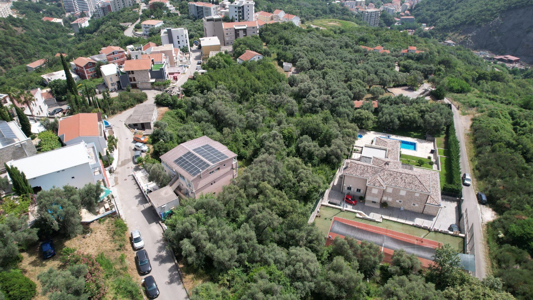 Plac 1597m2 sa Pogledom na More i Grad Bečići-Ivanovici - Amfora Real Estate