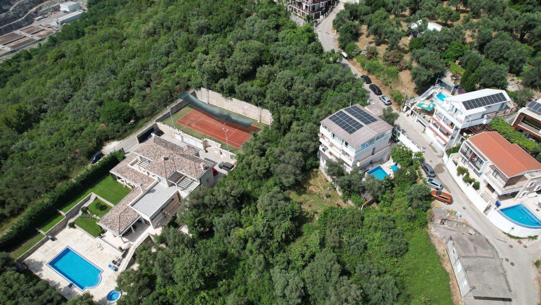 Plac 1597m2 sa Pogledom na More i Grad Bečići-Ivanovici - Amfora Real Estate