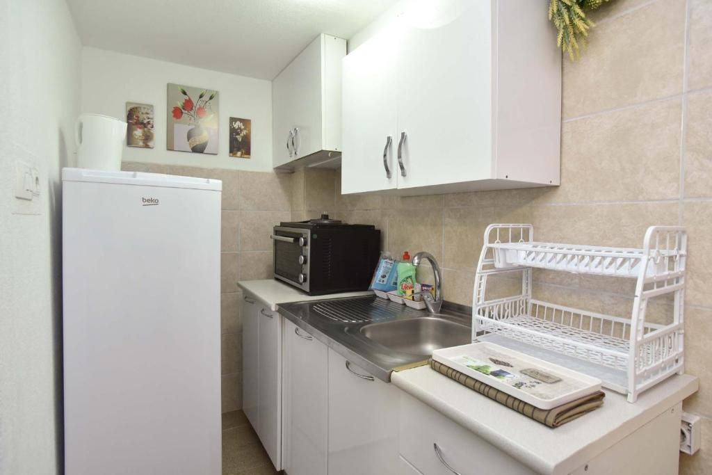 amforaproperty.com/Na prodaju kuća apartmanskog tipa 179 m² sa pogledom na more, Petrovac