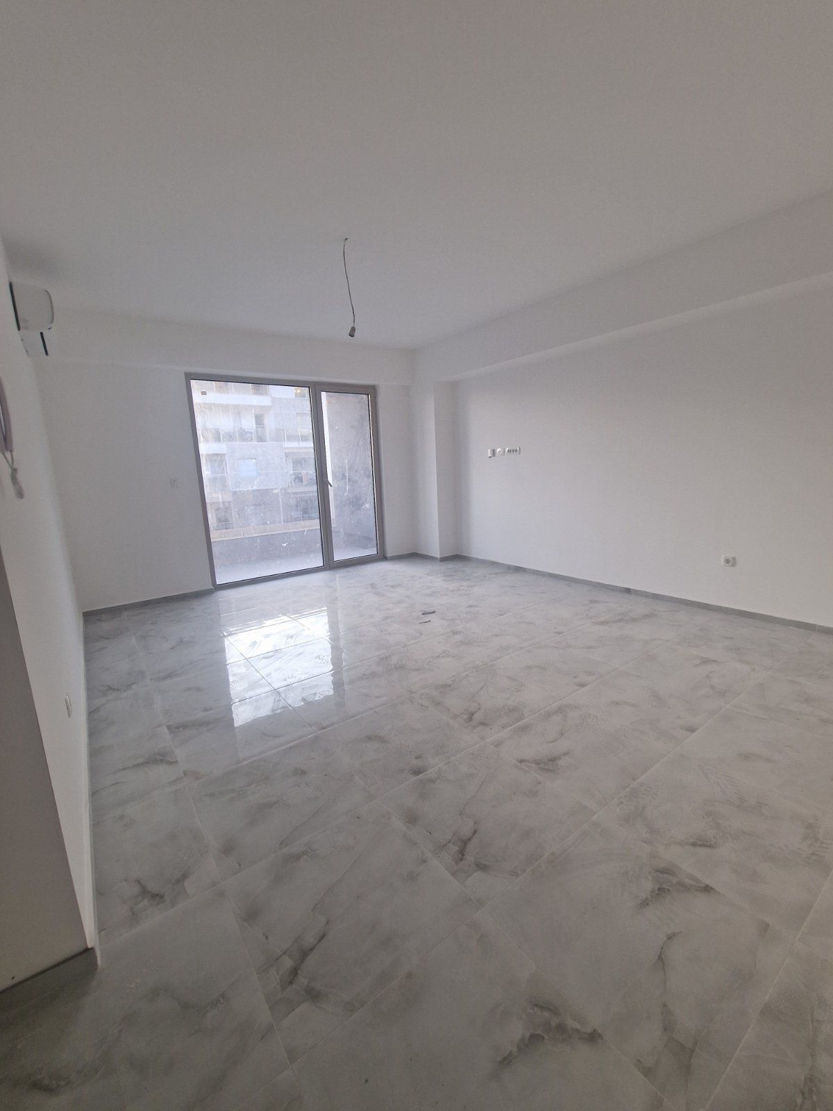 amforaproperty.com/Nov jednosoban stan 54 m² u novoj zgradi u Budvi, Rozino