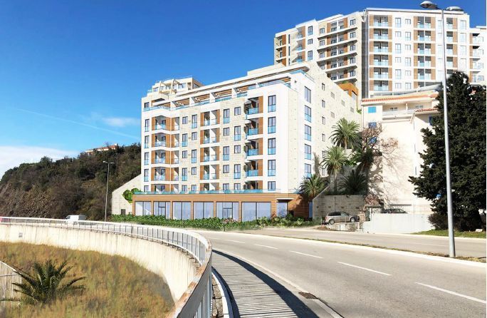 amforaproperty.com/Trosoban stan 85m2 u novom luksuznom stambenom kompleksu u izgradnji u Bečićima, bez poreza, 200 metara od plaže, sa pogledom na more