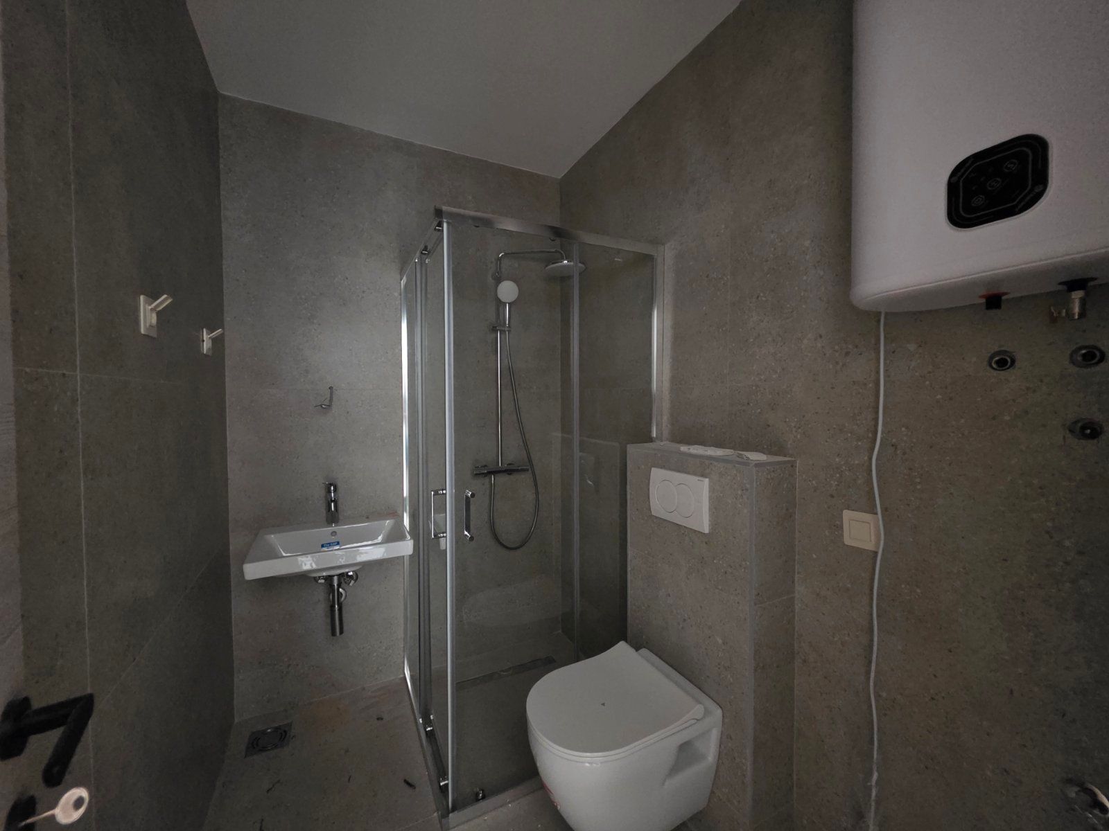 Dvosoban stan 53.10m² sa pogledom na more u novom stambeno poslovnoj zgradi-Budva,Adok - Amfora Real Estate