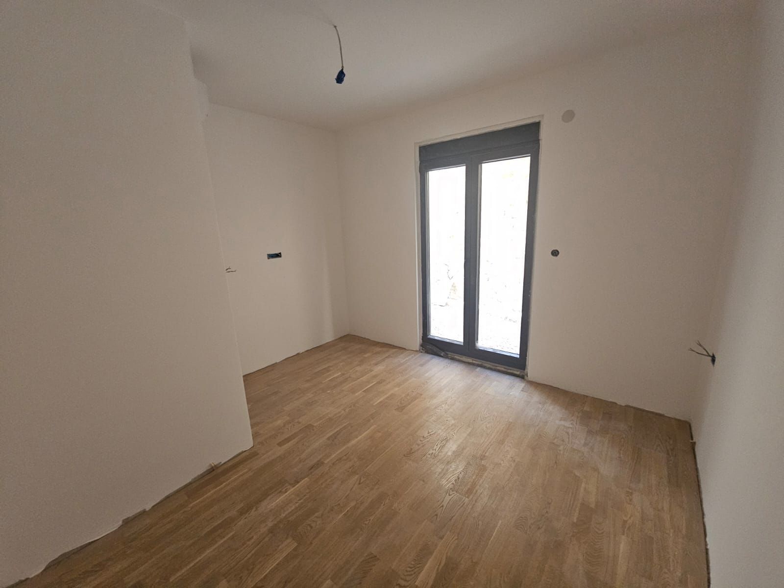 Prodaja – Nov dvosoban stan 52 m² sa gratis terasom u prestižnom GeoMaster kvartu, Gorica, Podgorica - Amfora Real Estate