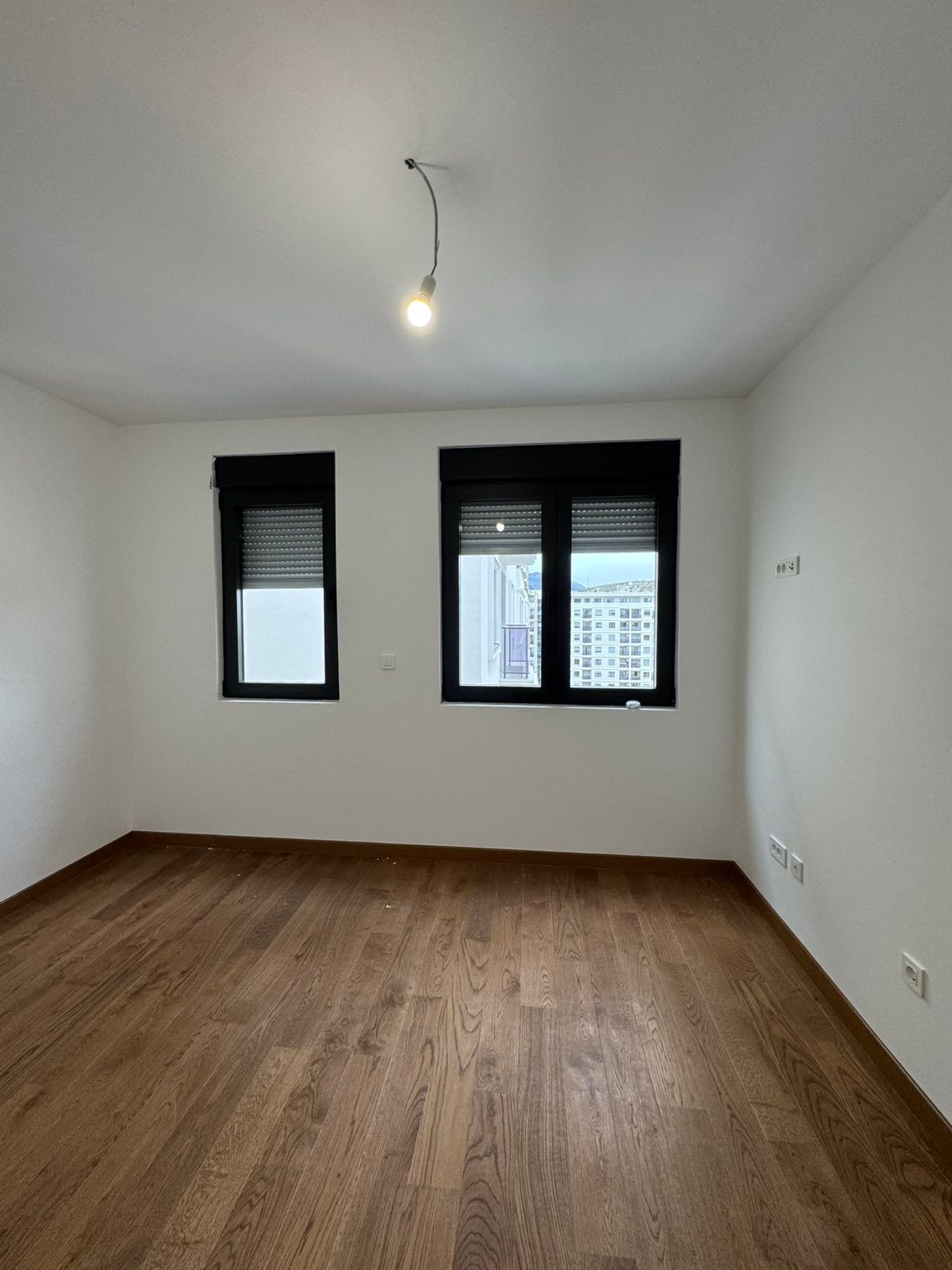 Izdavanje nenameštenog dvosobnog stana 64 m² sa garaznim mestom – Green Level 2, Podgorica (NA DUZI PERIOD) - Amfora Real Estate