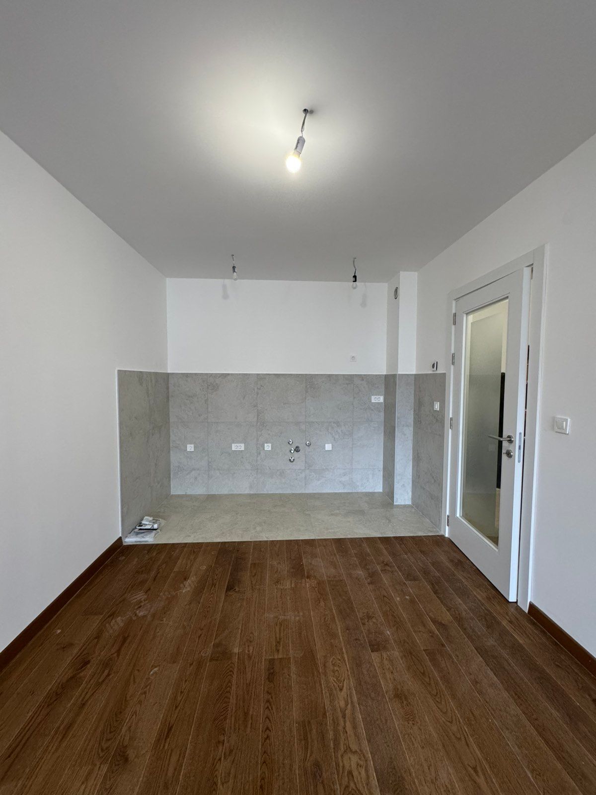 Izdavanje nenameštenog dvosobnog stana 64 m² sa garaznim mestom – Green Level 2, Podgorica (NA DUZI PERIOD) - Amfora Real Estate