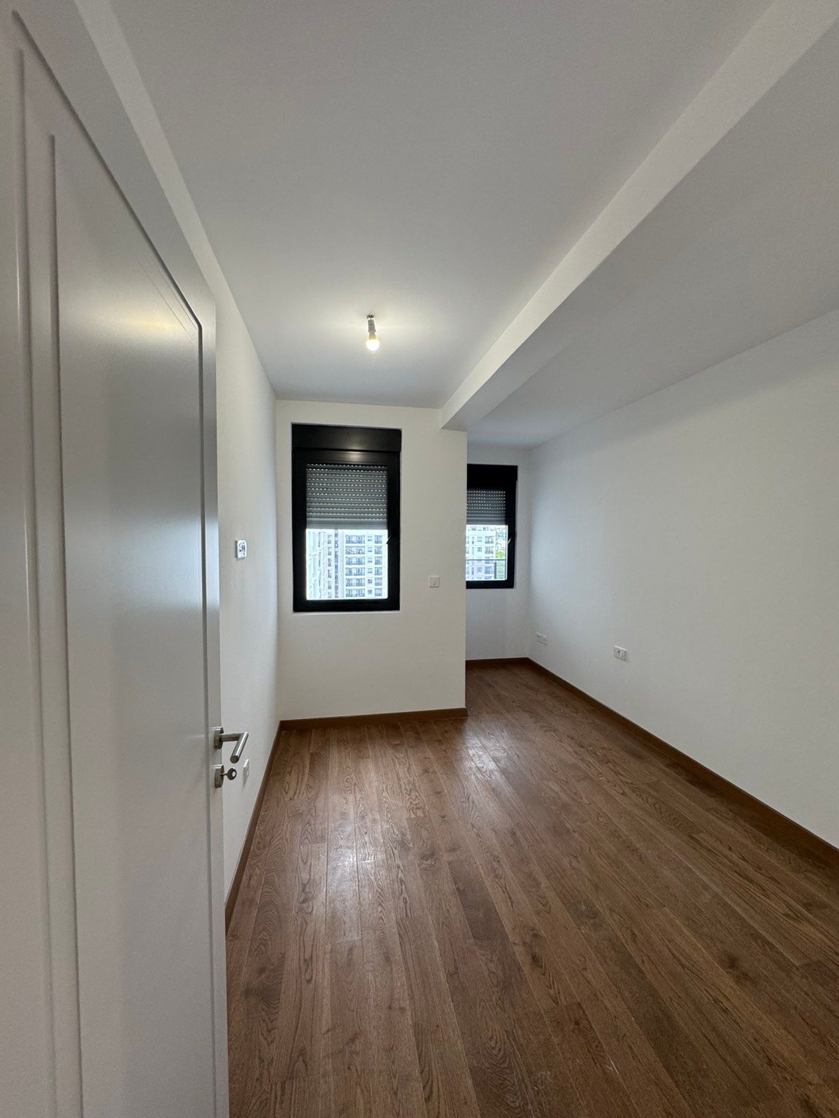 Izdavanje nenameštenog dvosobnog stana 64 m² sa garaznim mestom – Green Level 2, Podgorica (NA DUZI PERIOD) - Amfora Real Estate