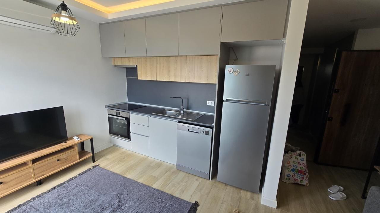 Prodaja prostranog dvosobnog apartmana 42 m² + terasa 15 m² sa bazenom, garažnim mestom i pogledom na more – Kava, Tivat - Amfora Real Estate