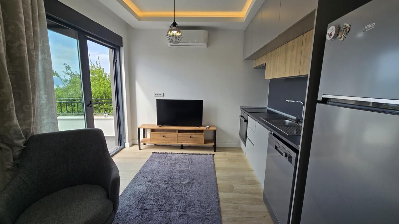 Prodaja prostranog dvosobnog apartmana 42 m² + terasa 15 m² sa bazenom, garažnim mestom i pogledom na more – Kava, Tivat - Amfora Real Estate