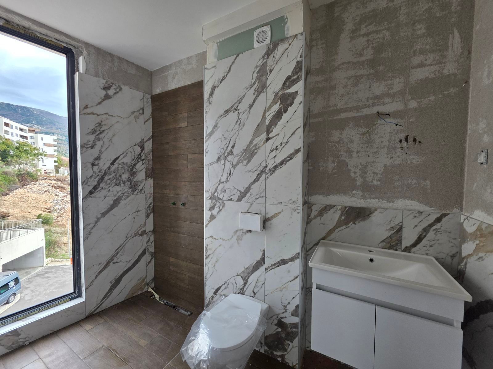 Prodaja novog luksuznog dvosobnog stana 105 m² sa garaznim mestom– Ivanovići, Bečići - Amfora Real Estate