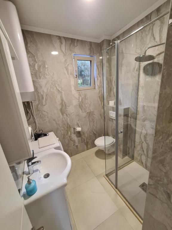 Prodaja luksuznog dvosobnog stana 64 m² sa pristupom bazenu – Rafailovići, Budva - Amfora Real Estate