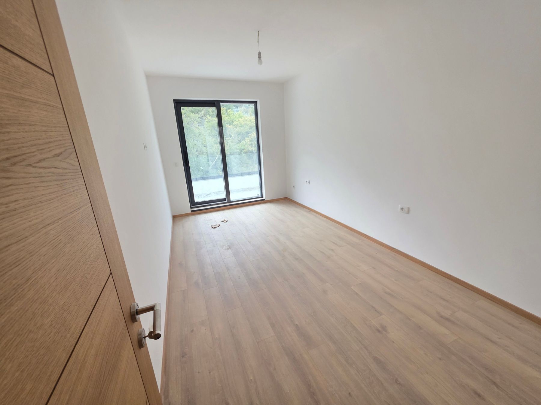 Prodaja jednosobnog stana 57m² u novogradnji sa bocnim pogledom na more, parkingom i oslobođenjem od poreza na prenos– Kamenovo, Budva - Amfora Real Estate