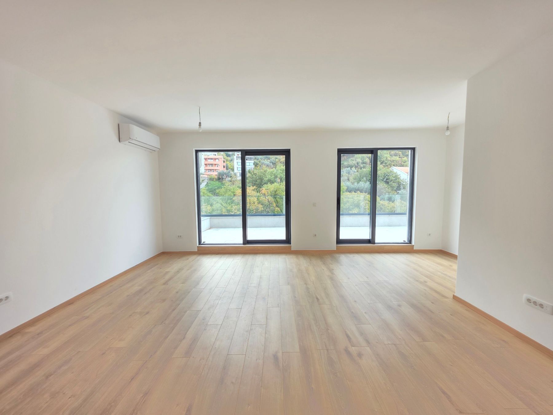 Prodaja dvosobnog stana 108m² u novogradnji sa pogledom na more,parkingom i oslobođenjem od poreza na prenos– Kamenovo, Budva - Amfora Real Estate