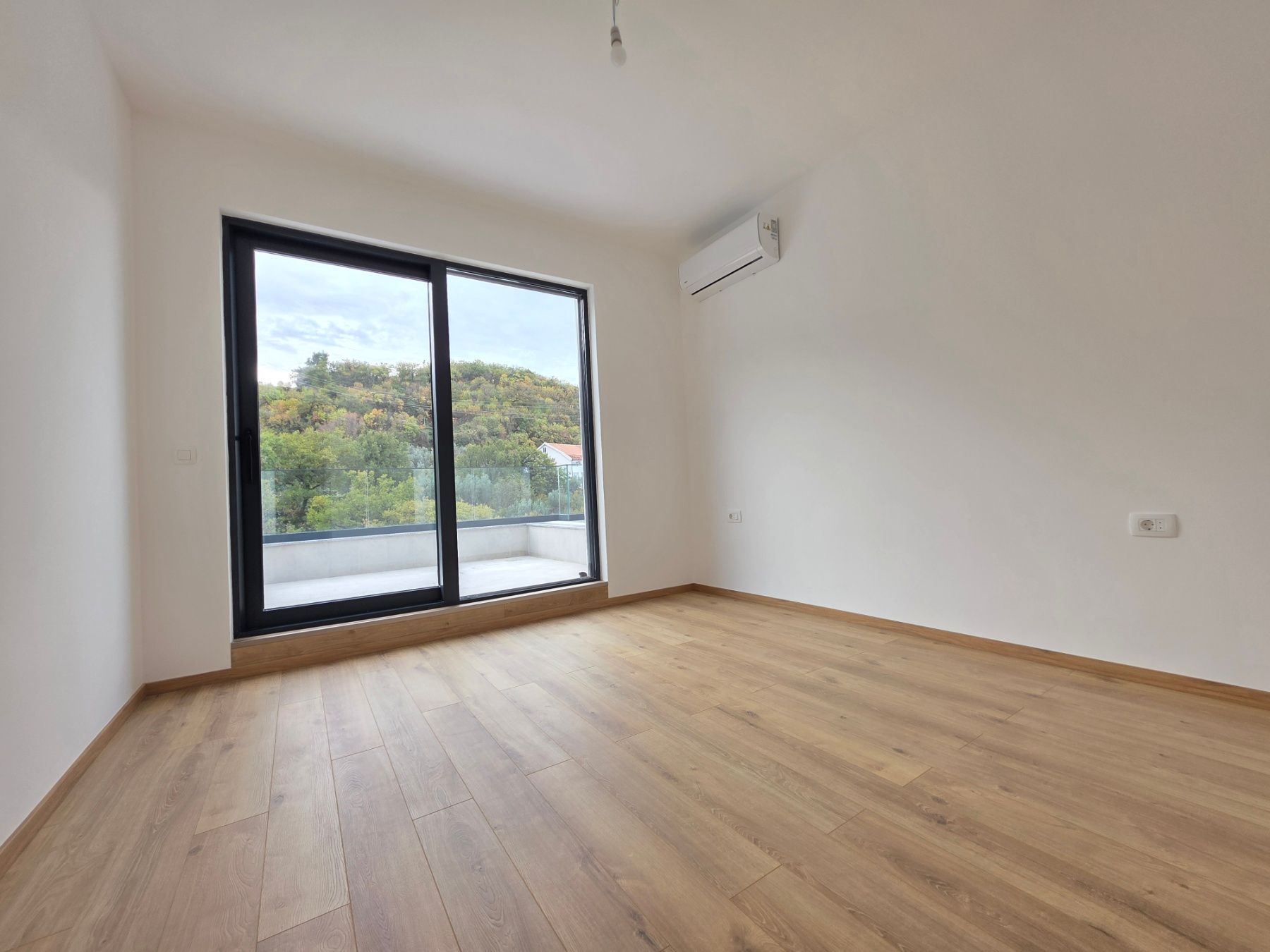 Prodaja dvosobnog stana 108m² u novogradnji sa pogledom na more,parkingom i oslobođenjem od poreza na prenos– Kamenovo, Budva - Amfora Real Estate