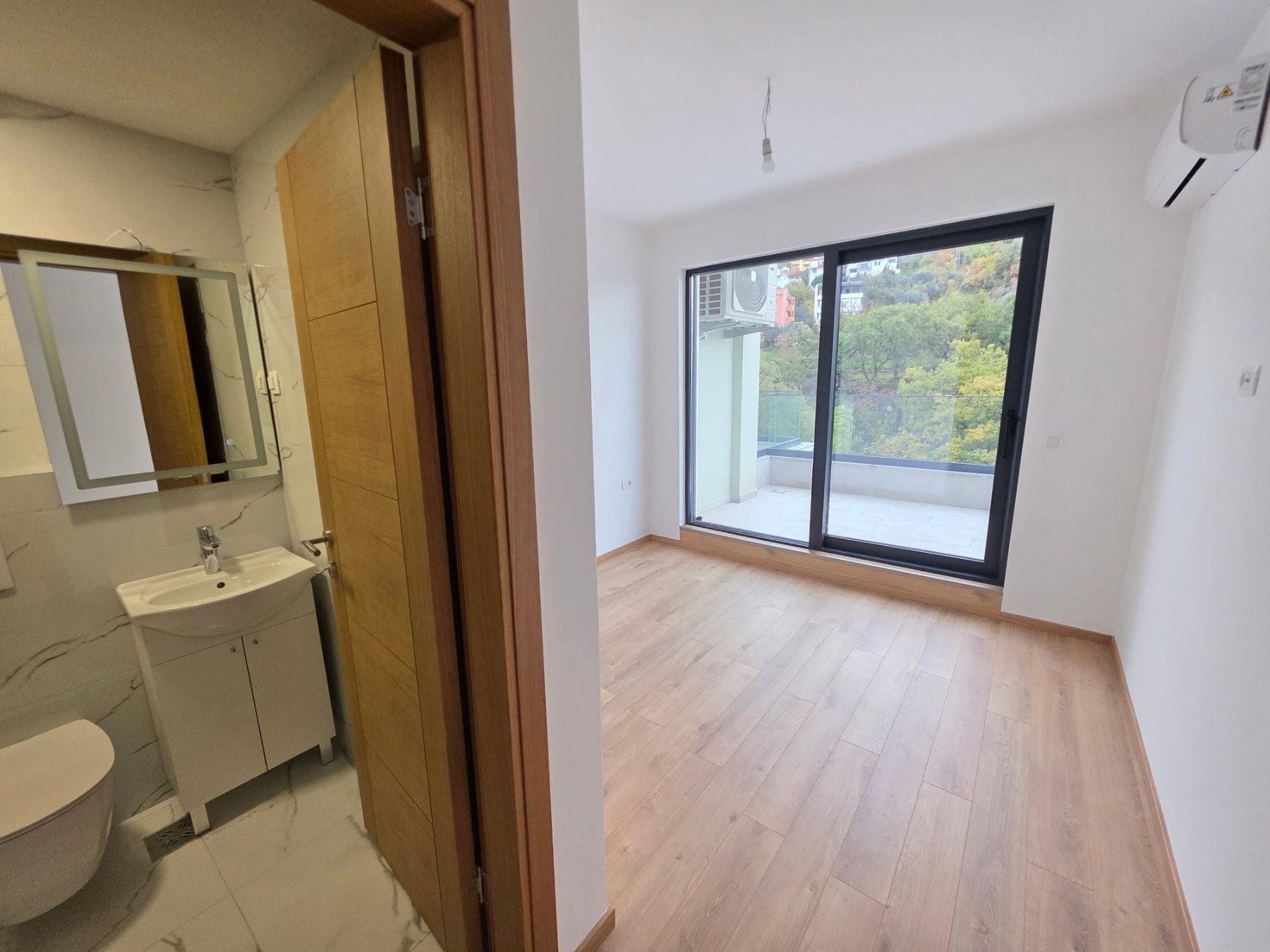Prodaja dvosobnog stana 114m² u novogradnji sa pogledom na more,parkingom i oslobođenjem od poreza na prenos– Kamenovo, Budva - Amfora Real Estate