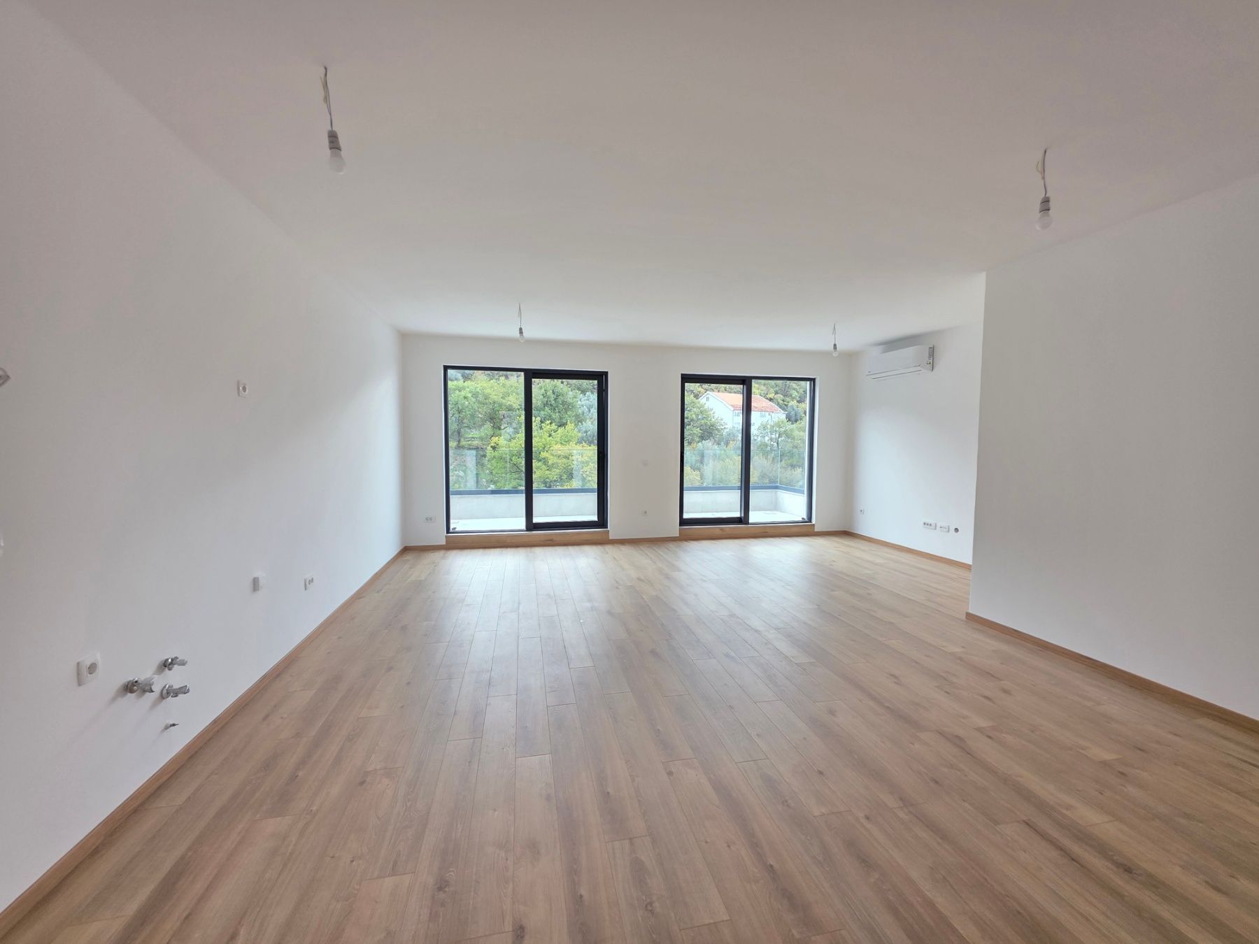 Prodaja dvosobnog stana 114m² u novogradnji sa pogledom na more,parkingom i oslobođenjem od poreza na prenos– Kamenovo, Budva - Amfora Real Estate