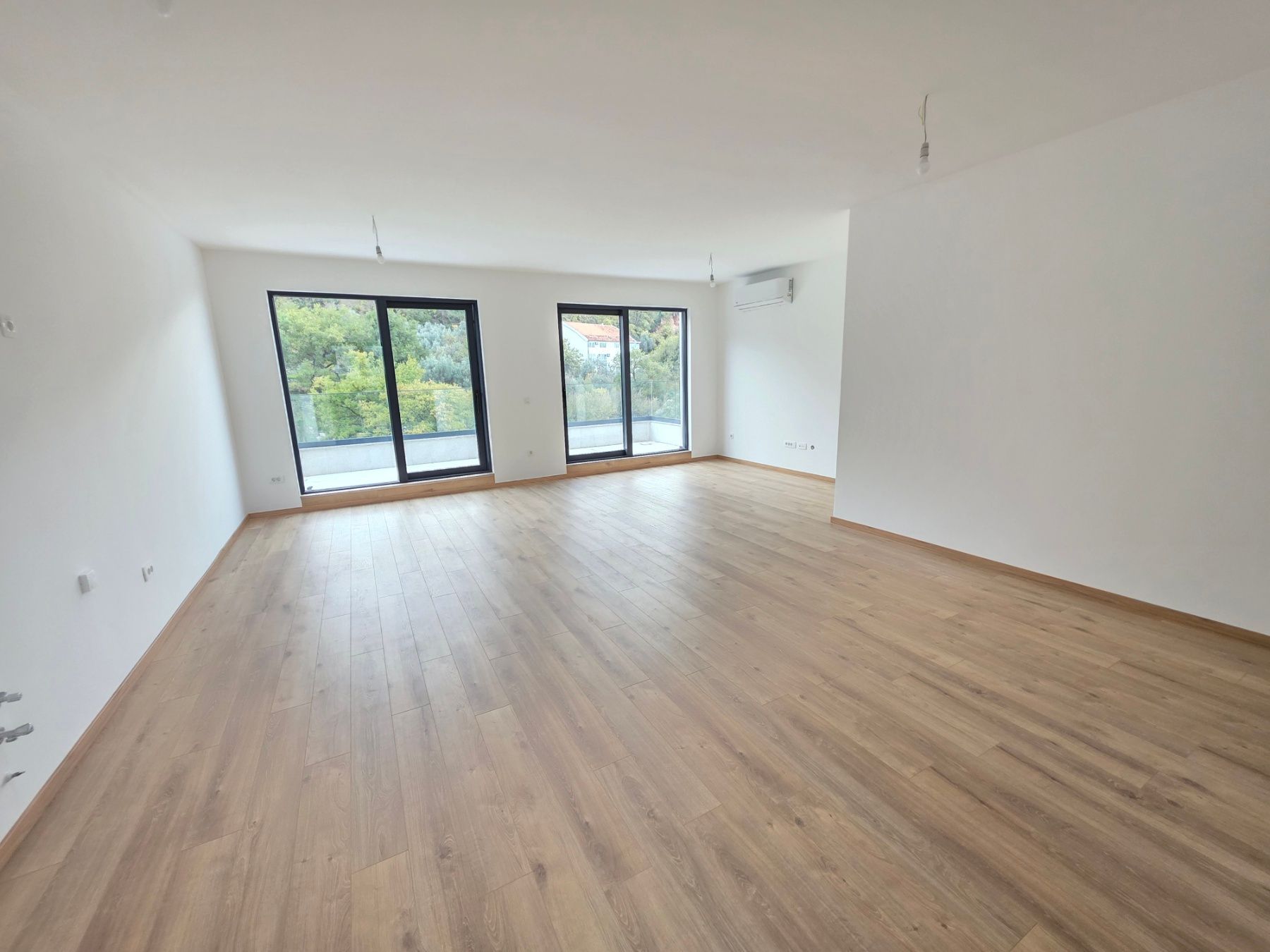 Prodaja dvosobnog stana 114m² u novogradnji sa pogledom na more,parkingom i oslobođenjem od poreza na prenos– Kamenovo, Budva - Amfora Real Estate