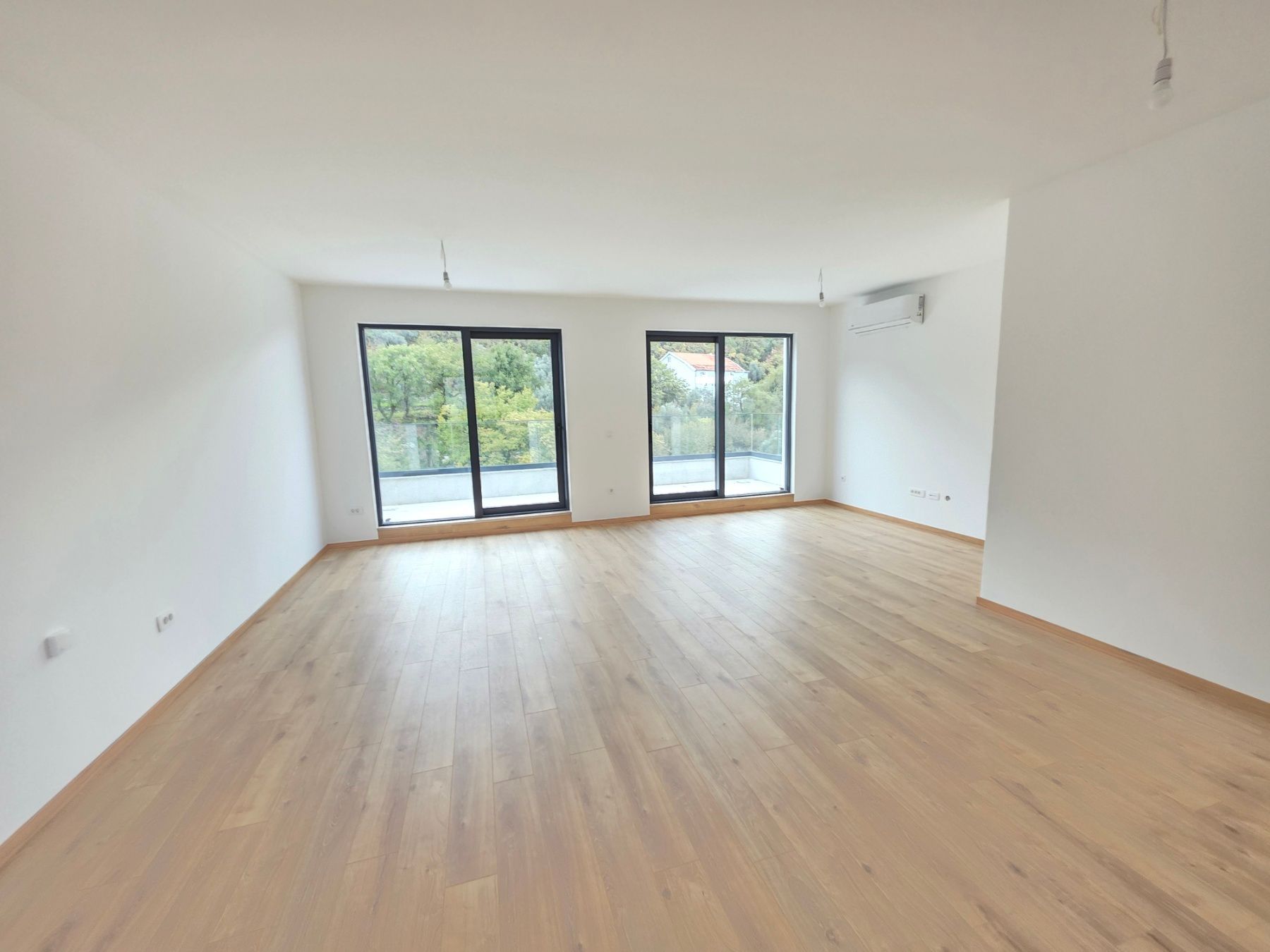 Prodaja dvosobnog stana 114m² u novogradnji sa pogledom na more,parkingom i oslobođenjem od poreza na prenos– Kamenovo, Budva - Amfora Real Estate