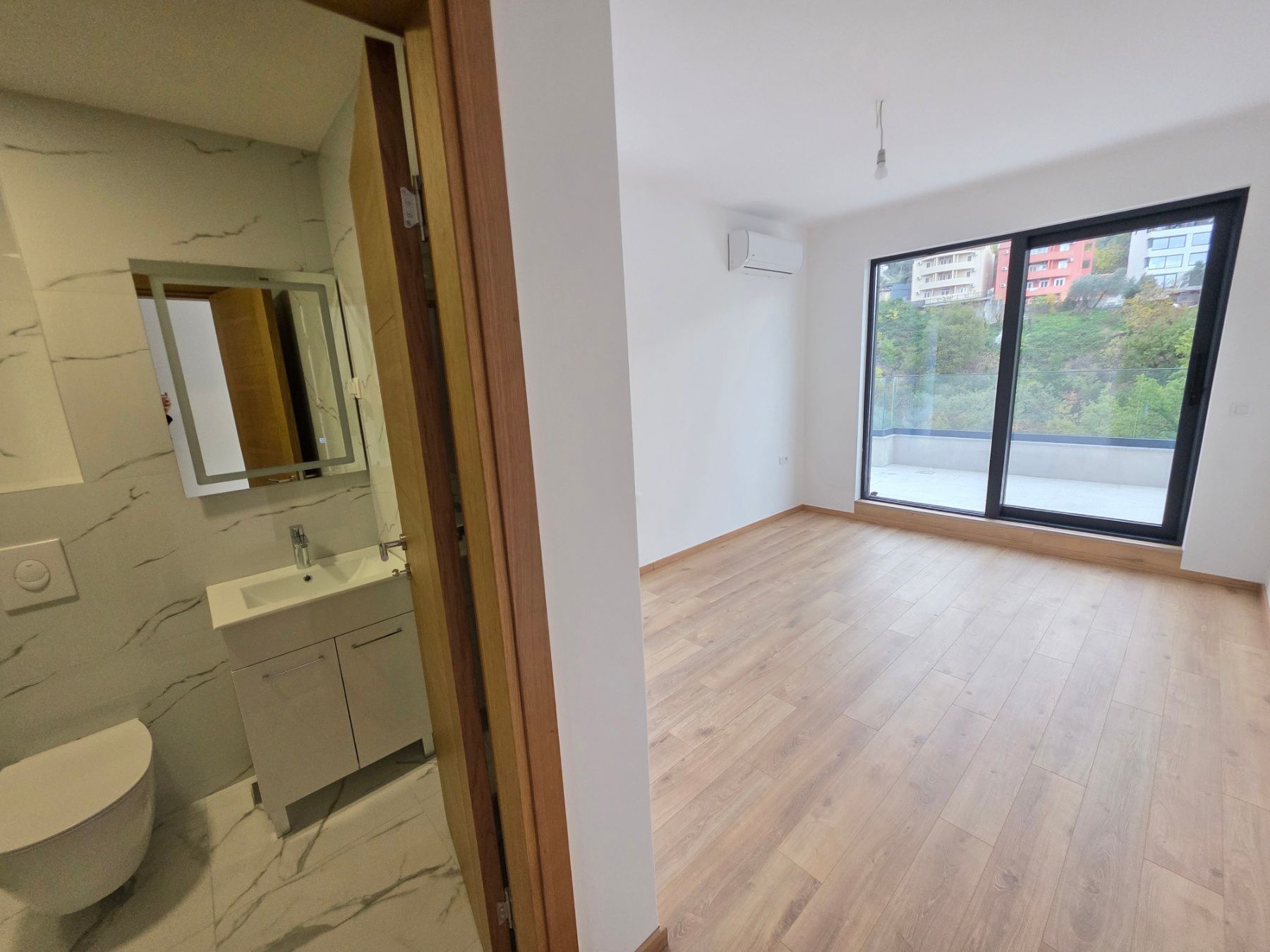 Prodaja dvosobnog stana 164m² u novogradnji sa pogledom na more,parkingom i oslobođenjem od poreza na prenos– Kamenovo, Budva - Amfora Real Estate