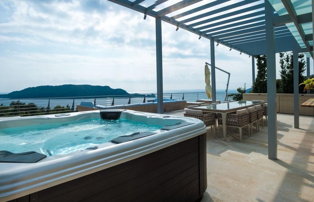 Ekskluzivan duplex penthouse 562m² sa rooftop terasom i panoramskim pogledom na more – Dukley Gardens, Budva - Amfora Real Estate