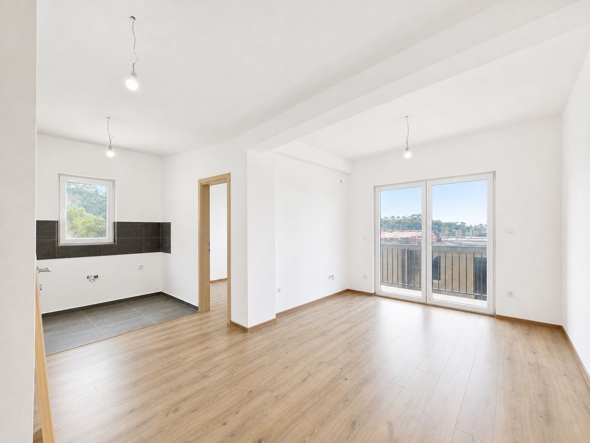 Prodaja novog dvosobnog stana 54 m² sa parking mestom i pogledom na grad i more – Petrovac - Amfora Real Estate