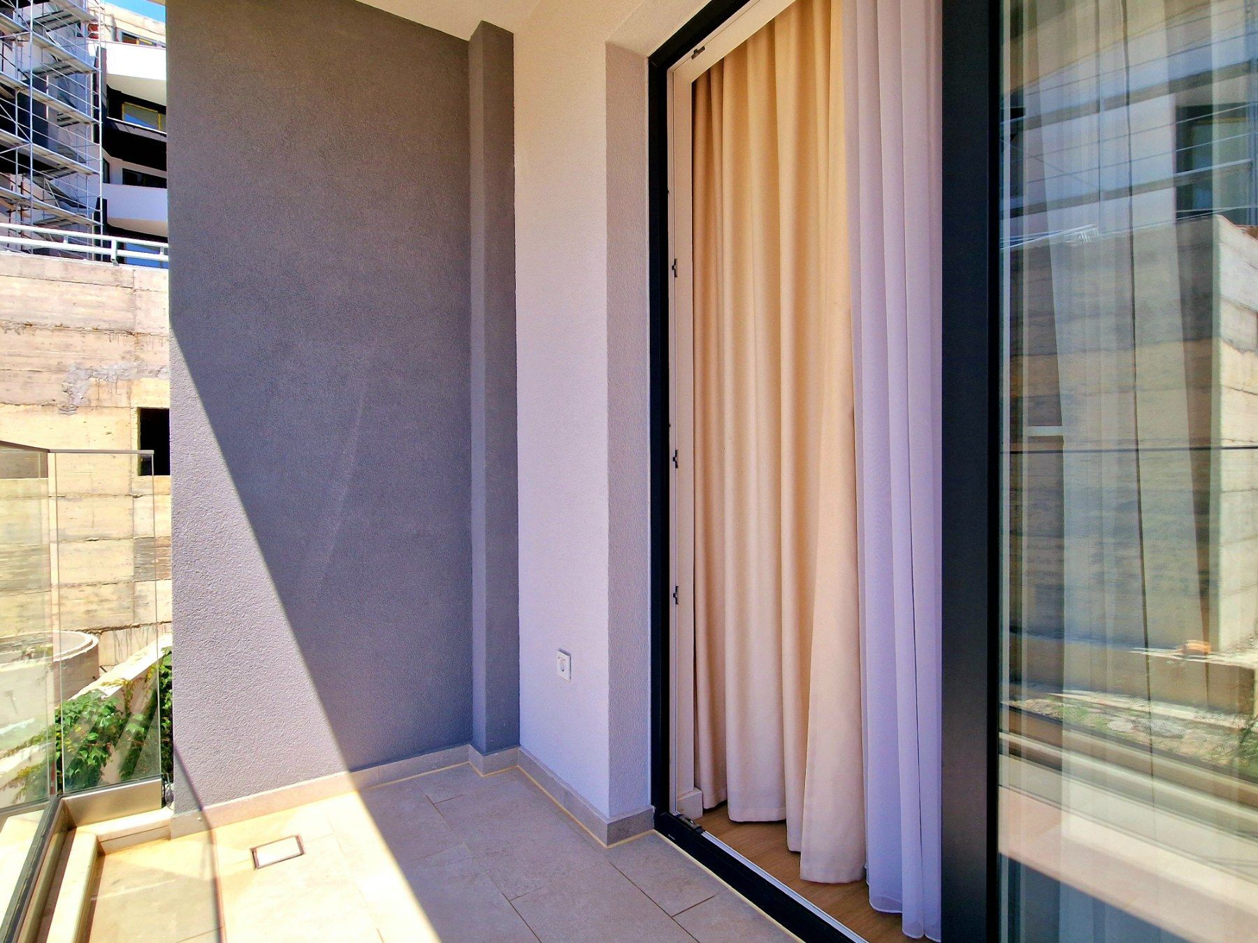 Luksuzan jednosoban stan 41m2,sa delimičnim pogledom na more ,Becici. - Amfora Real Estate