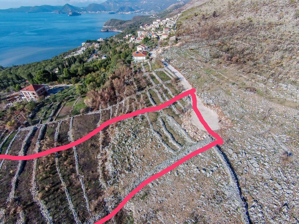 Plac 2550m2 sa otvorenim pogledom na more i idejnim projektom za hotel i vilu, Reževići. - Amfora Real Estate