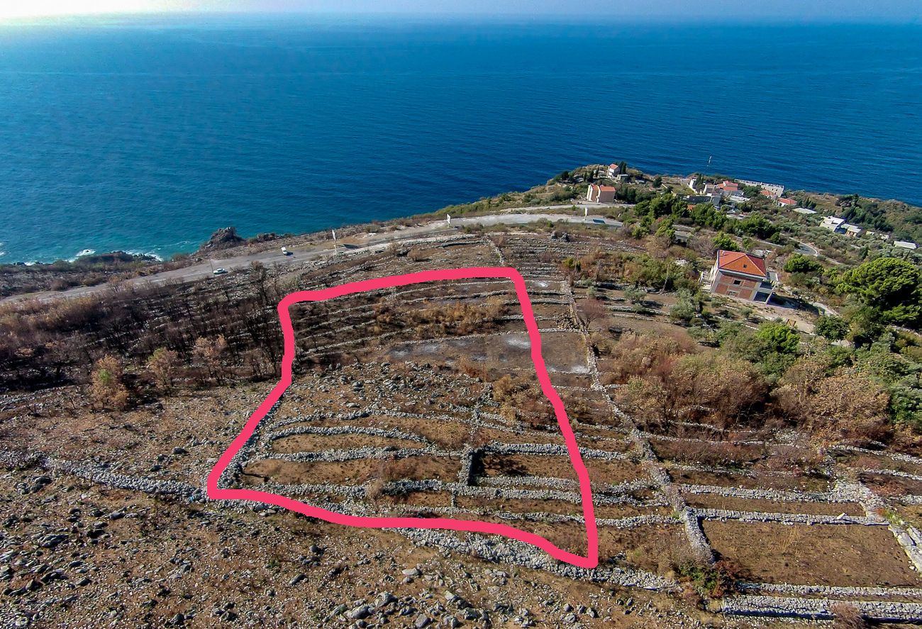 Plac 2550m2 sa otvorenim pogledom na more i idejnim projektom za hotel i vilu, Reževići. - Amfora Real Estate