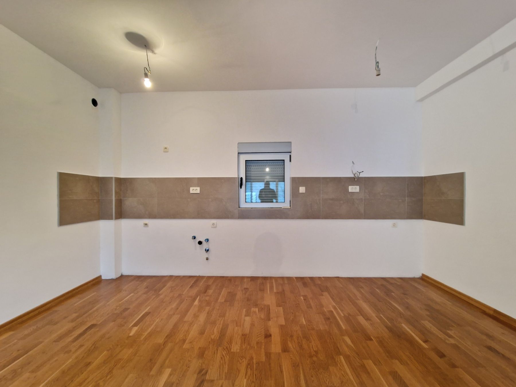 Nov dvosoban stan 83m2 sa bočnim pogledom na more,Rafailovići (Budva) - Amfora Real Estate