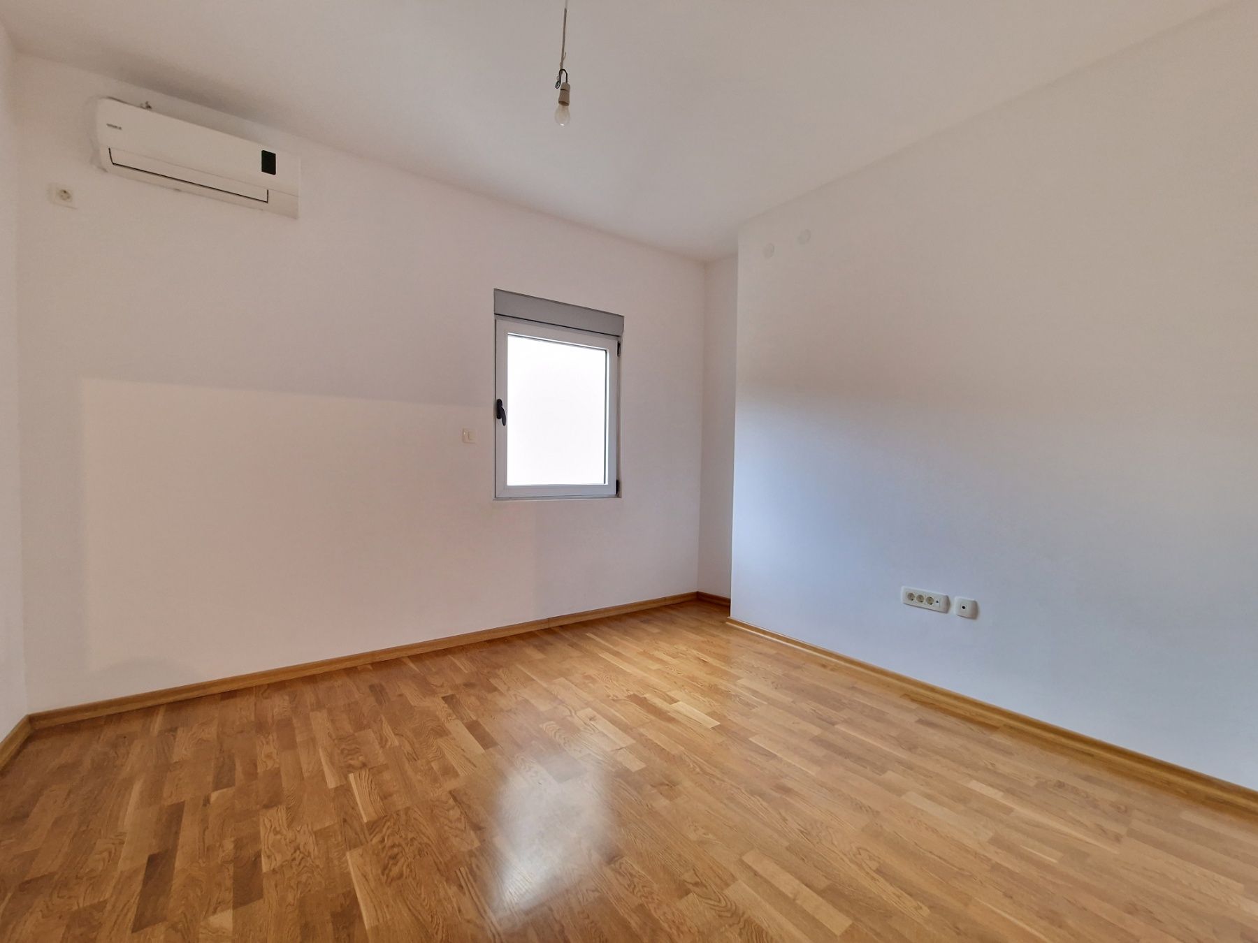 Nov dvosoban stan 83m2 sa bočnim pogledom na more,Rafailovići (Budva) - Amfora Real Estate