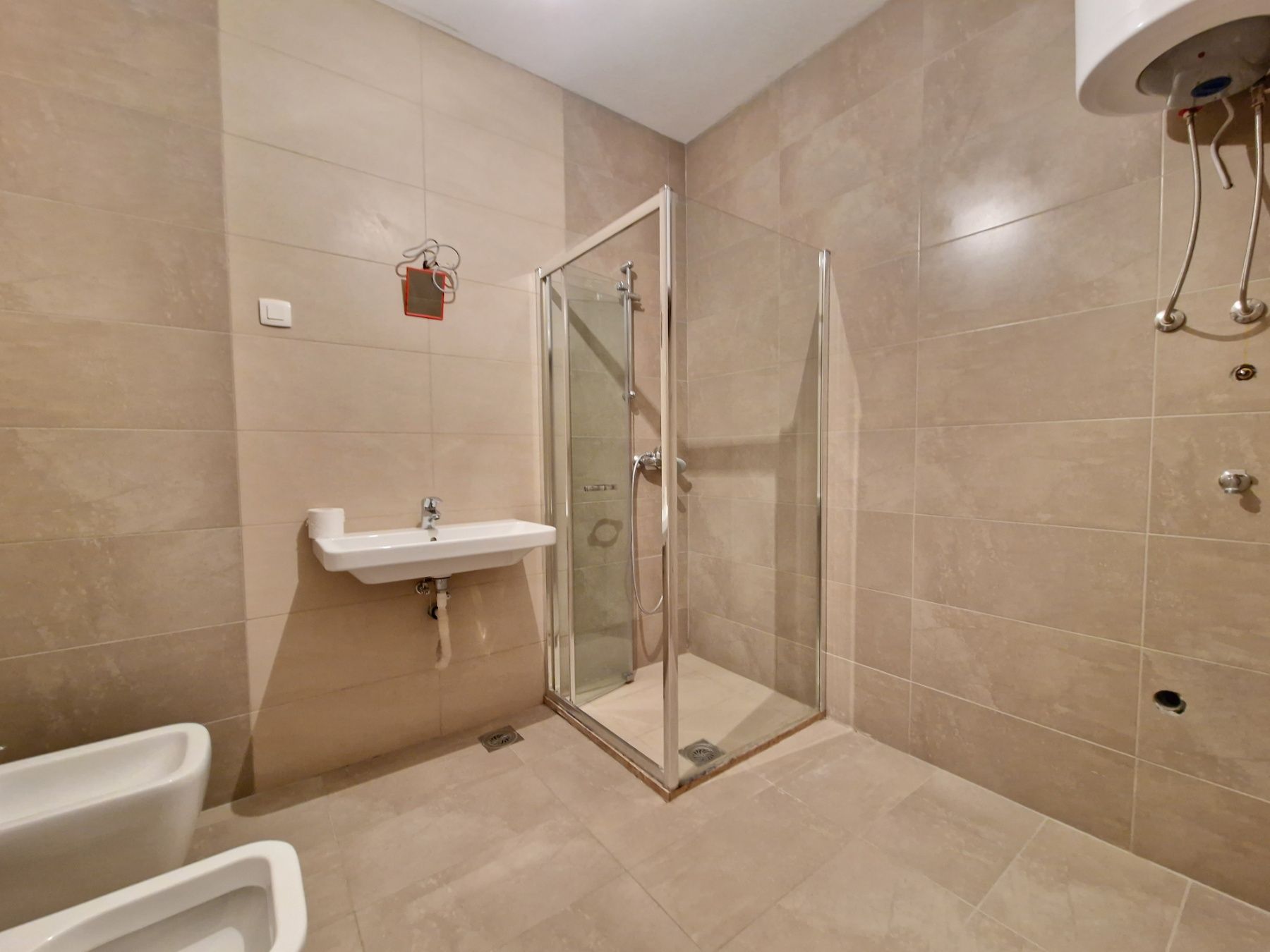 Nov dvosoban stan 83m2 sa bočnim pogledom na more,Rafailovići (Budva) - Amfora Real Estate