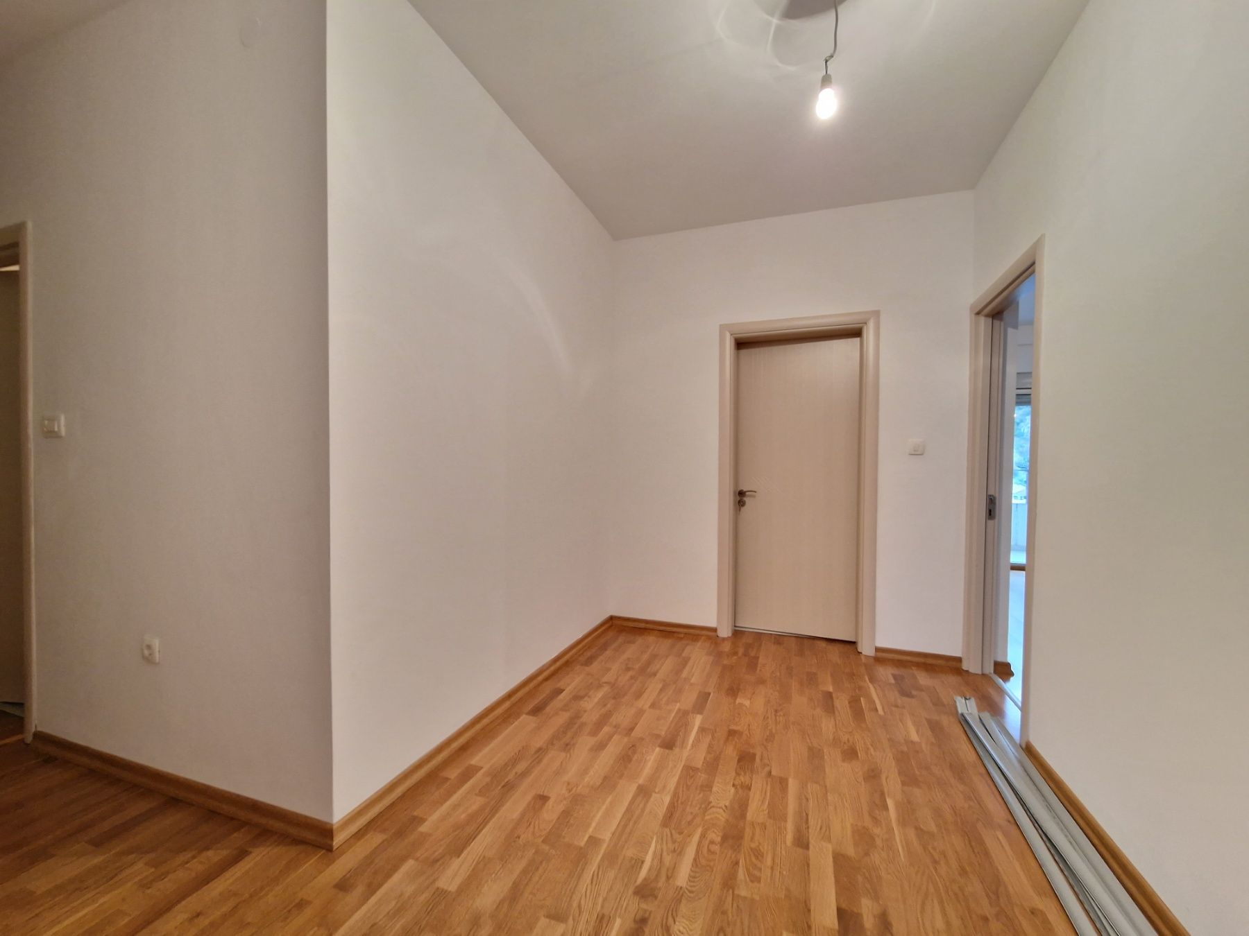 Nov dvosoban stan 83m2 sa bočnim pogledom na more,Rafailovići (Budva) - Amfora Real Estate