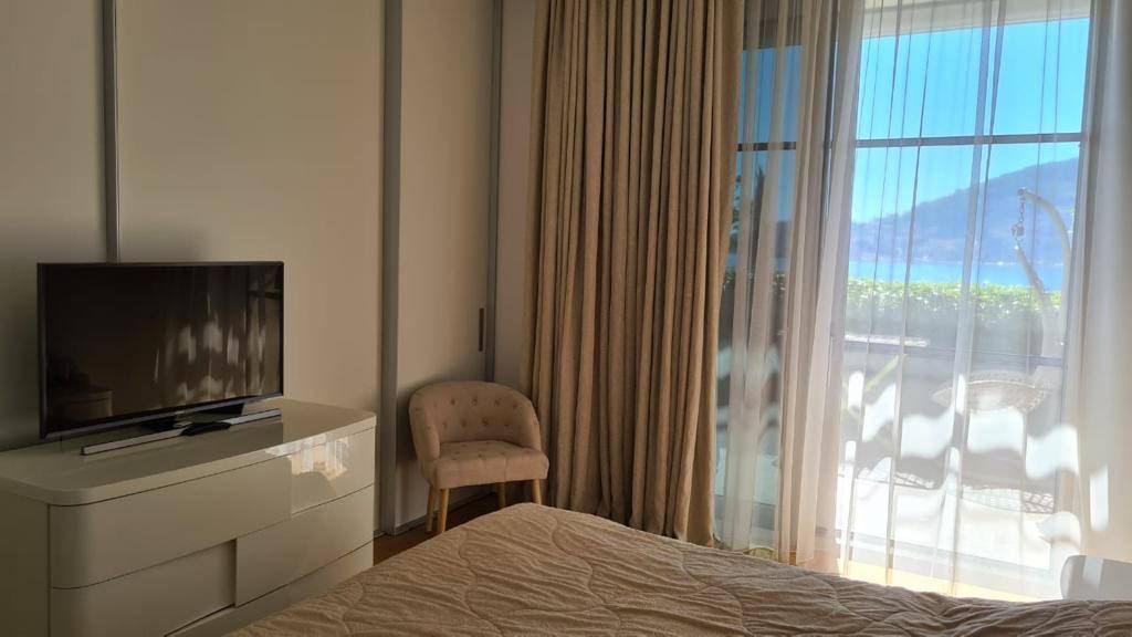 Luksuzan jednosoban stan 100m2 sa panoramskim pogledom na more u luksuznom kompleksu «Dukley Gardens» Budva - Amfora Real Estate