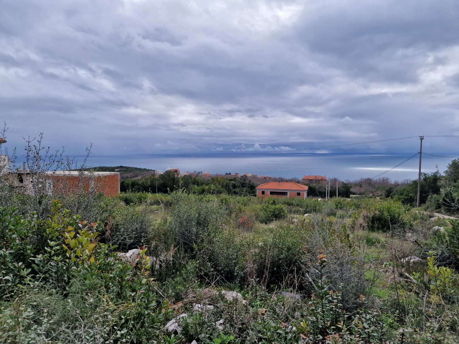 Urbanizovan plac  600m2 sa pogledom na more,Krimovica-Opstina Kotor. - Amfora Real Estate