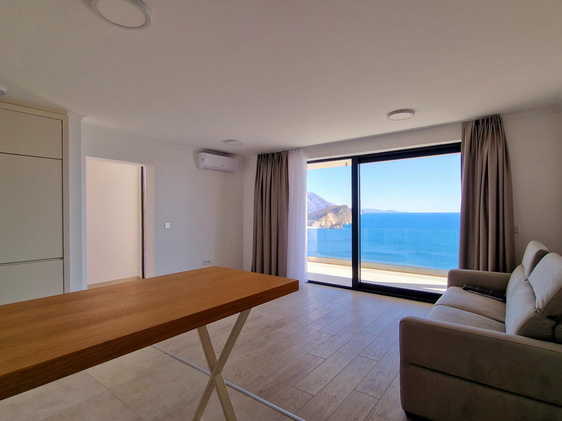 EKSKLUZIVNO!! NOV JEDNOSOBAN STAN 73,1m2 U NOVOIZGRADJENOM KOMPLEKSU SA JEDINSTVENIM POGLEDOM NA MORE I GRAD U  BUDVI  - Amfora Real Estate