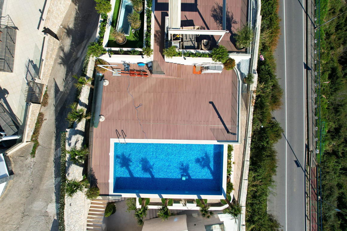 EKSKLUZIVNO!! NOV JEDNOSOBAN STAN 73,1m2 U NOVOIZGRADJENOM KOMPLEKSU SA JEDINSTVENIM POGLEDOM NA MORE I GRAD U  BUDVI  - Amfora Real Estate